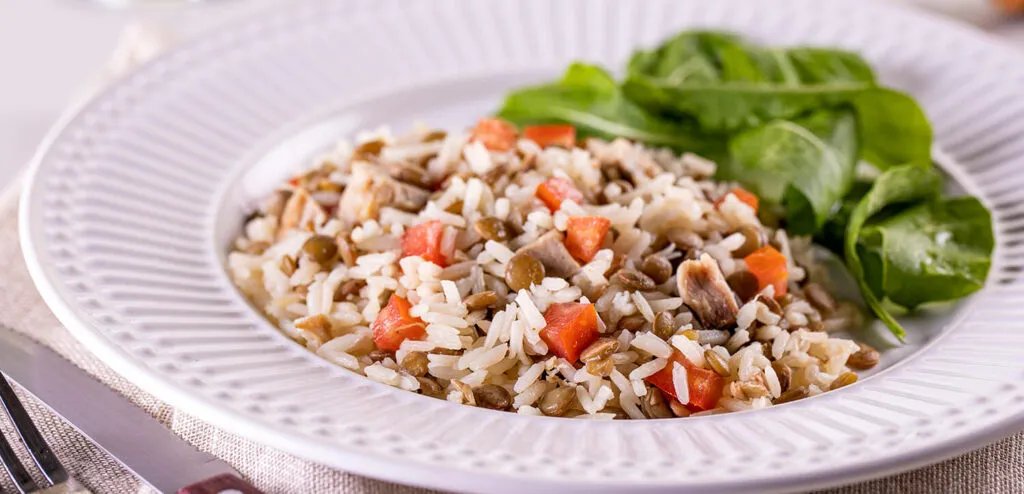 Arroz com lentilha e pernil