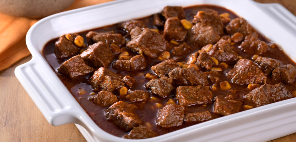 CARNE COZIDA AO MOLHO VERMELHO